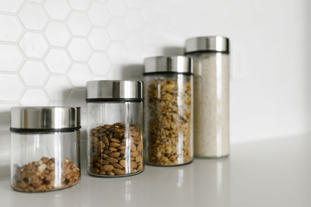 Labeled pantry containers and organized shelves